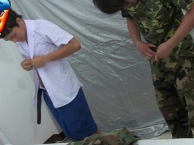 Asian schoolboy gives a handjob to a horny soldier
