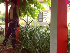 Young and horny solo boy explores China Town garden in the nude
