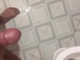 Asian boy indulges in solo play, inviting viewers to watch