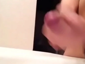 Gay Asian jerking off to climax