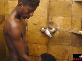 African beauty gives blow job in the shower and then has doggy style sex.